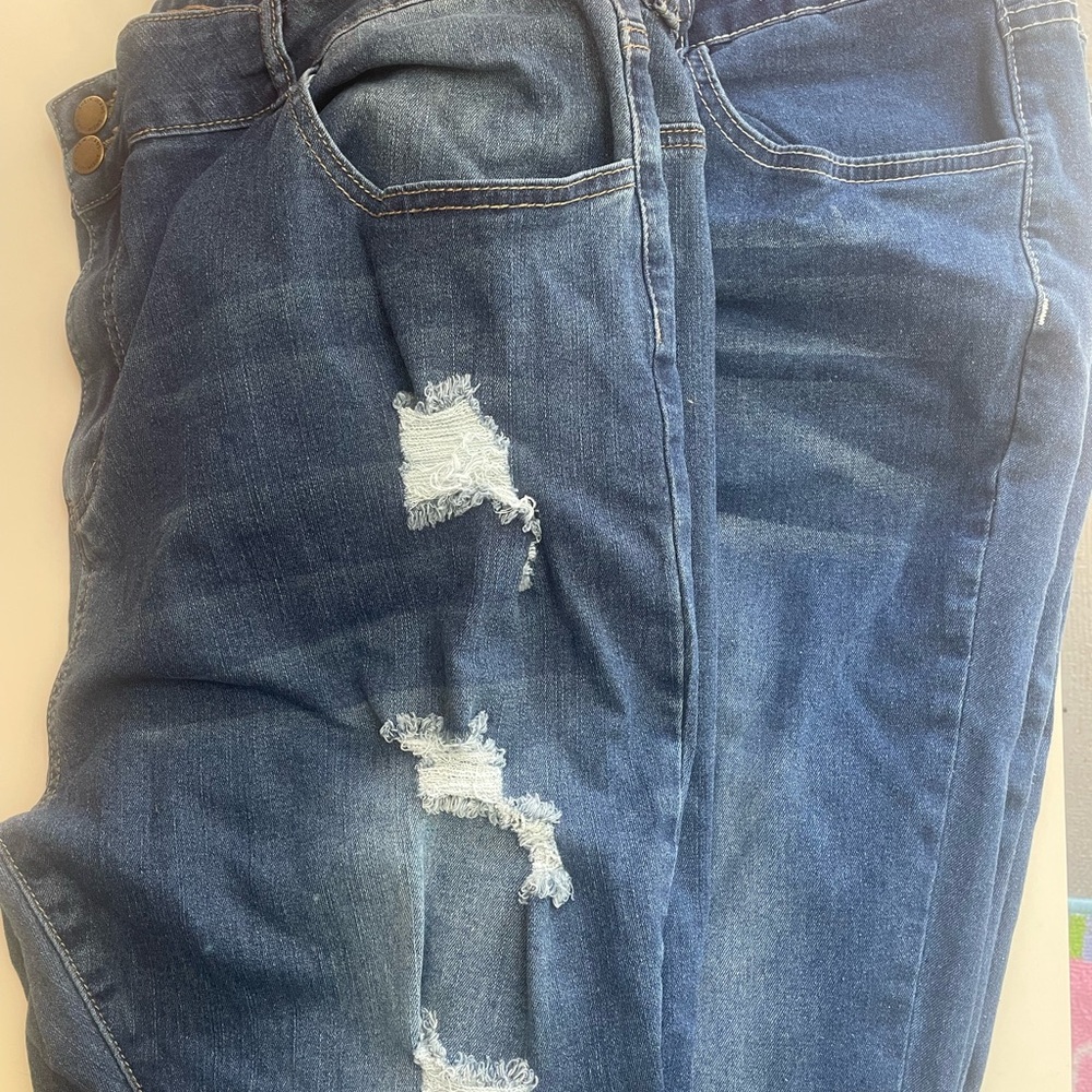 Distressed Blue Jeans